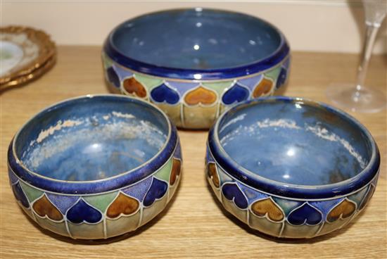 A Royal Doulton hearts bowl and a pair of smaller matching bowls